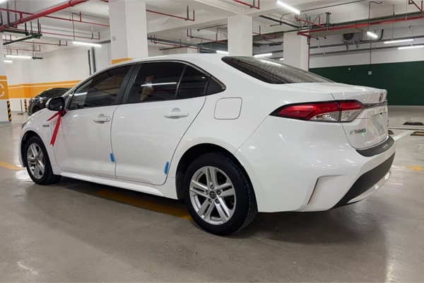 A batch of new cars in stock - Toyota Corolla 1.8L hybrid models manufactured in May 2022